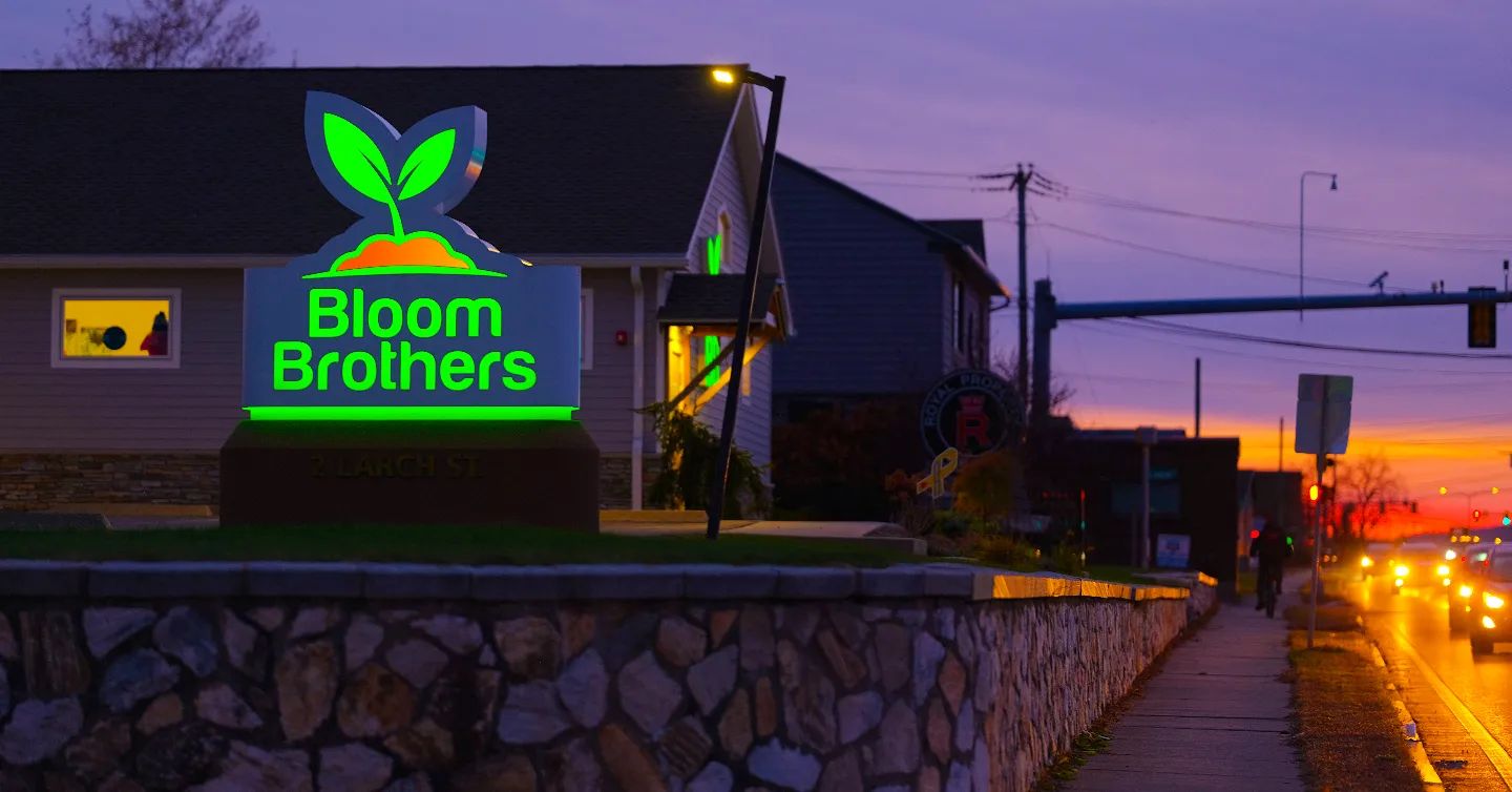 bloom brothers dispensary at night